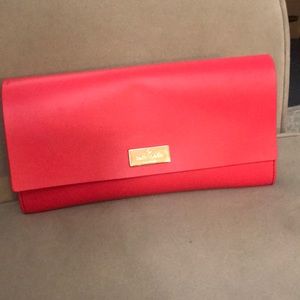Hot pink kate spade clutch